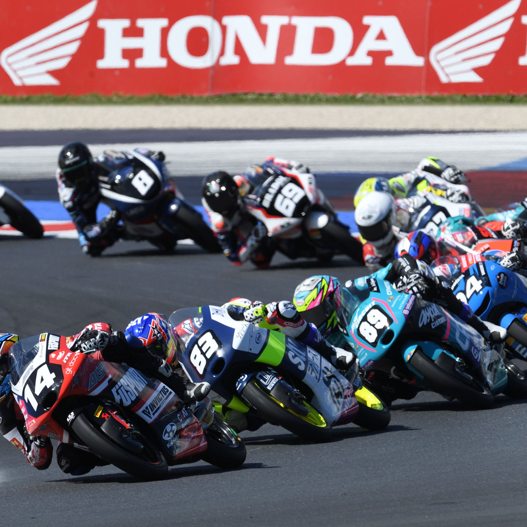 Cormac Buchanan (#14) leads Moto3 group, 2024 Emilia-Romagna JuniorGP. Credit: JuniorGP.